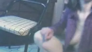 Slim babe plays with toy