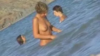 some hot braless babe on the beach