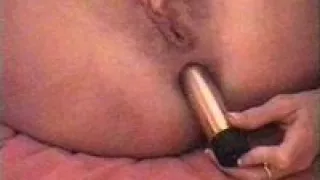 Horny milf pleasuring with dildo