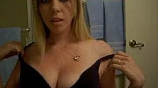 Horny sexy blonde w/ big tits strips