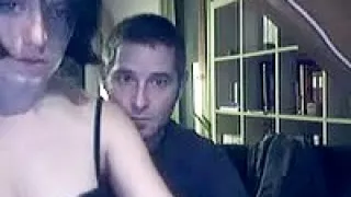 Dark-haired chick gets naked