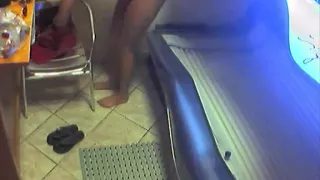 Voyeur clip of chick getting tanned