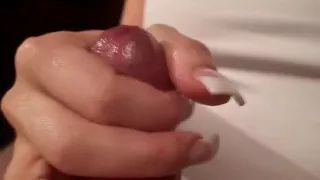 German chick strokes guys dick with her hands