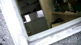 Hot Brunette with big tits wearing lingerie voyeur