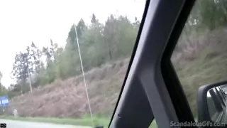 Hot Babe rubbing a cock while the guy driving caught on tape