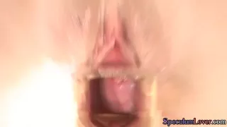 Speculum teen toys and fingers her pussy before gaping