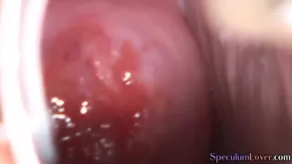 Oiled teen gapes and masturbates her wet and shaved pussy