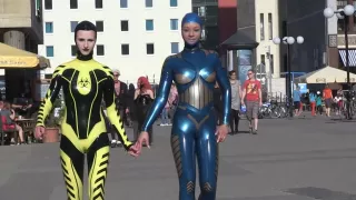 Through The City In A Tight Latex Costume - Watch4Fetish