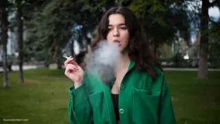 Beautiful Brunette Is Smoking Cork Strong Cigarettes