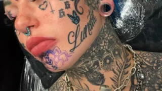 Amber Luke Getting a Chin Tattoo