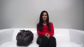 Delightful brunette with medium tits is kneeling on the floor and sucking her partners hard cock