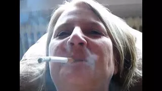Mature slut smoking