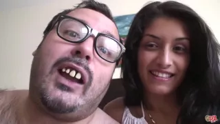 Fat man with glasses is fucking a fresh, teen brunette and ejaculating all over her face