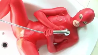 Red zentai in shower