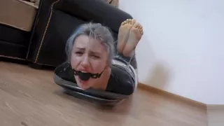 mummified girl flexes bare soles