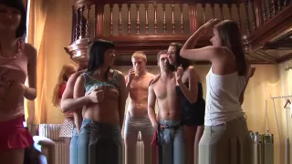 College teens pissing together in bathroom