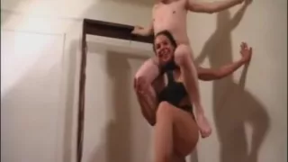 brunette girl lifting a nude guy