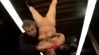 Girl hanging and spanked