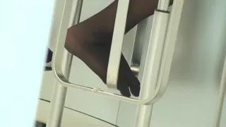 candid shoeply hostess in pantyhose