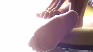 The Golden Touch (candid bare feet in library)