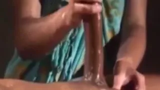 Asian Woman Sensually Massages An Asian Hunks Dick