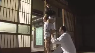 Japanese Hottie Tied to Post and Gagged