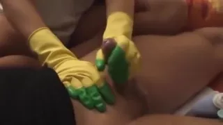 Housewife In Yellow Rubber Gloves Gives Handjob With Oil