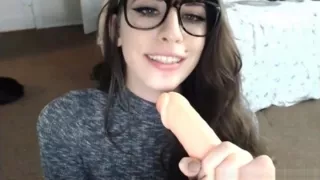 Brunette nerd with pierce like to sucking