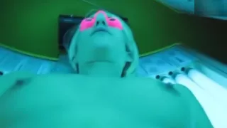 Blonde amateur masturbating at tanning salon