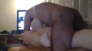 big love doll in front of television  - watching a granny porn