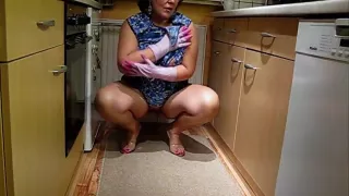 Mature German Lady Trying On Aprons