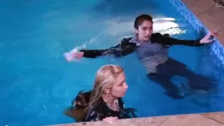 2 cuties in leather jackets and jeans get wet