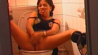 Masturbating exhibitionists in the bathroom