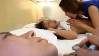 Asian Girl Getting Her Nipples Sucked Pussy Rubbed While 3 Rd Girl Sleeping On The Bed