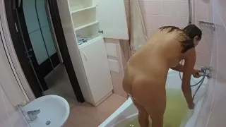 brunette shave in shower