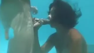 Underwater orgy oral sex
