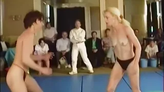 Topless Housewives mat wrestling