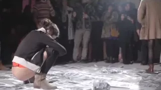 young girls and ladies or young men peeing behind public in hall