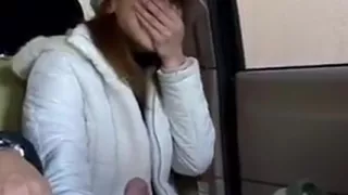 Giggly young Asian picked up on street and strokes cock in the car