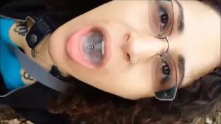 Amateur babe with glasses sucking cock.