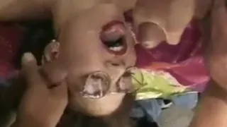 Brunette blows 2 cocks together