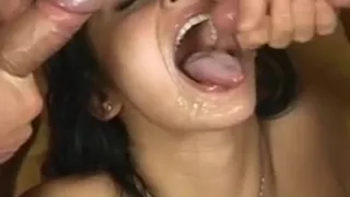 Dark haired bitch blows 3 cocks at once