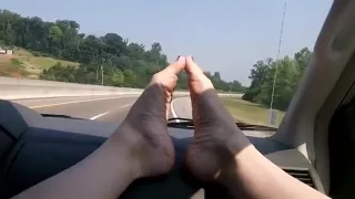 Sexy barefoot car ride