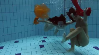 Two redheads swimming SUPER HOT!!!