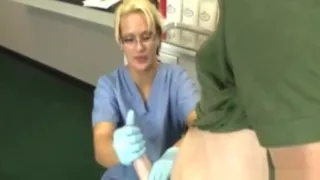 Gloved doctor wanks patient till big cumload