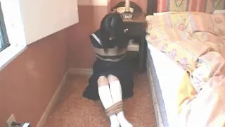 Japanese school girl tape gagged-2