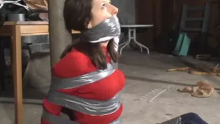 Duct Taped Nice And Tight To A Pole In The Basement In Her Red Sweater