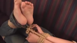 Erica being hogtied