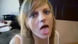 Blonde plays with cum in her mouth