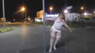 Exhibitionist mature lady shows her stockings